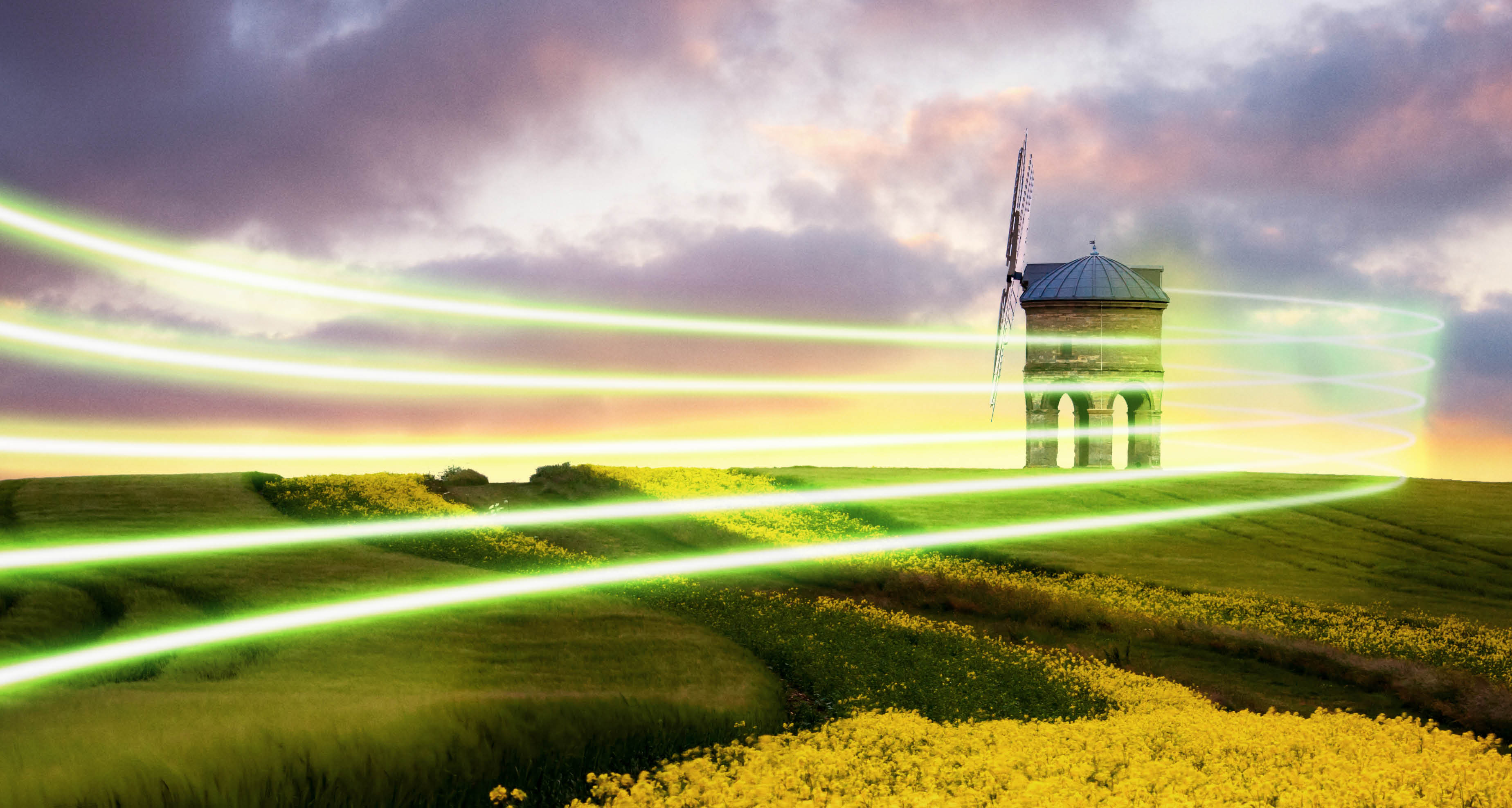Sunset over a rape field at Chesterton Windmill, Warwickshire, England