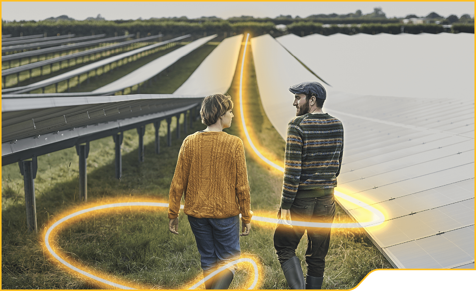 Young farmers walking through their solar farm, talking to each other