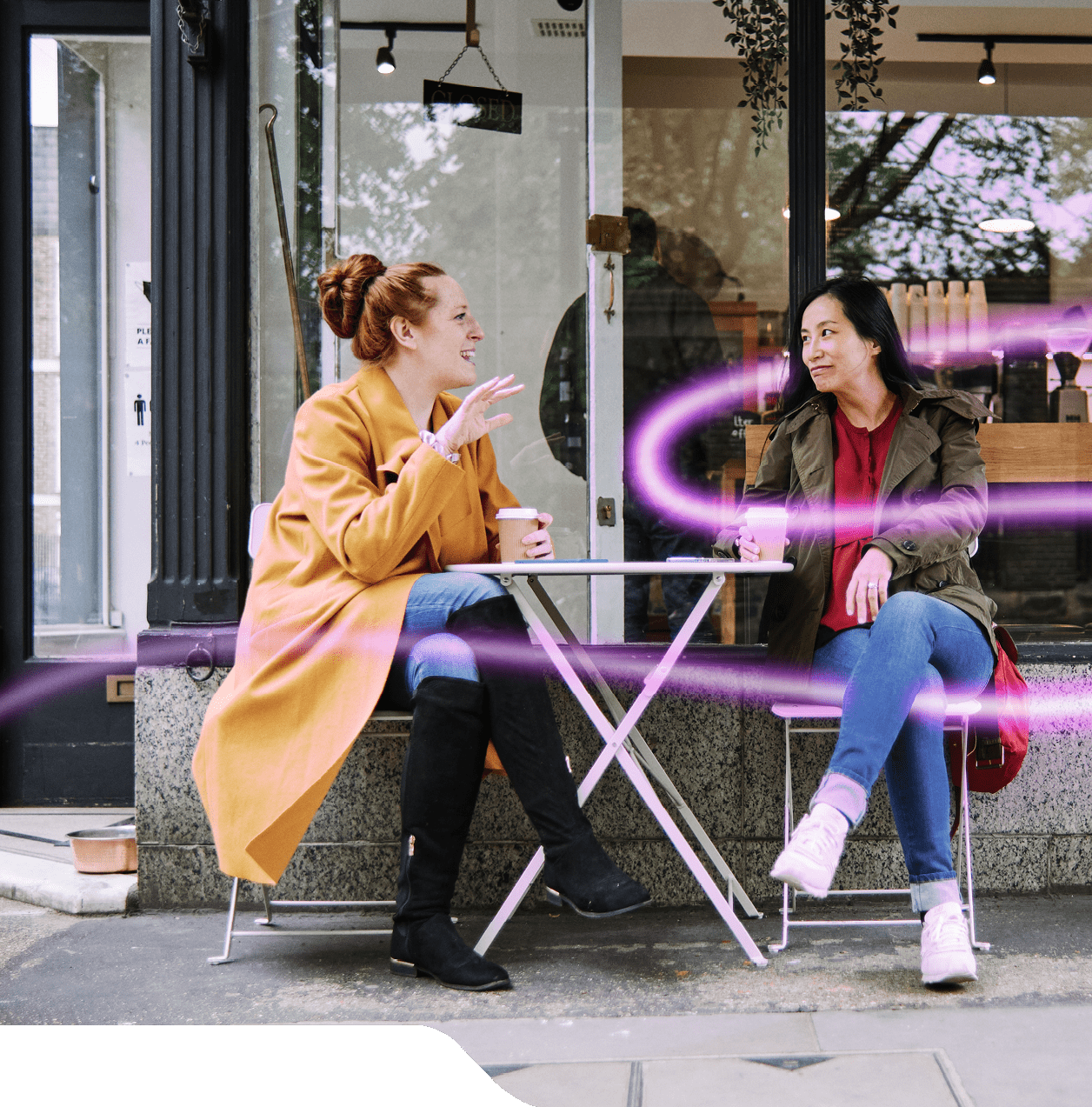 Friends hanging out and having a good time in a cafe. London, Engalnd.